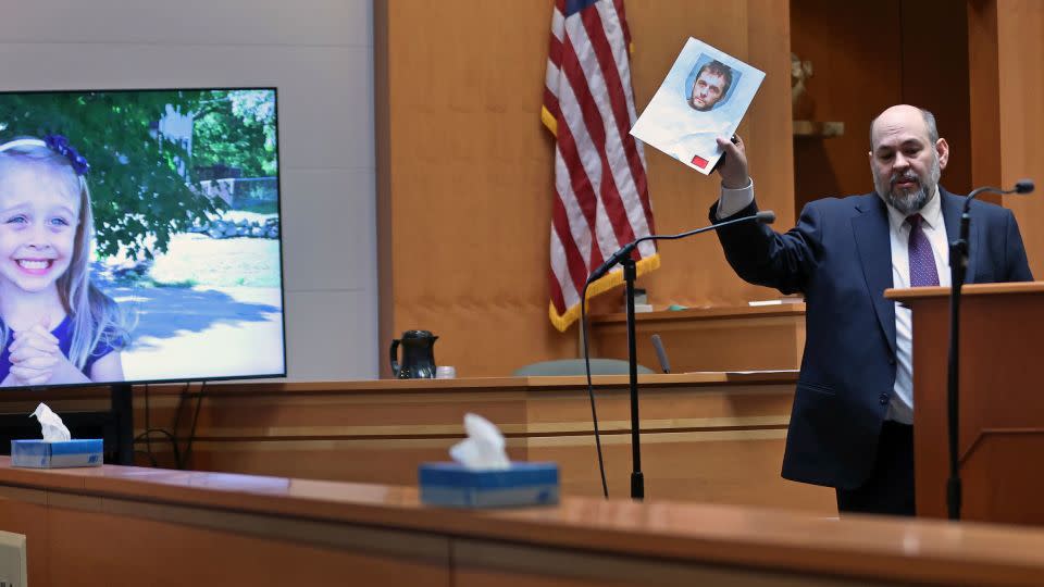 Senior Assistant New Hampshire Attorney General Benjamin Agati shows the jury a photograph of Adam Montgomery during closing arguments on February 21, 2024, in Manchester, New Hampshire. - Jim Davis/Pool/The Boston Globe/AP