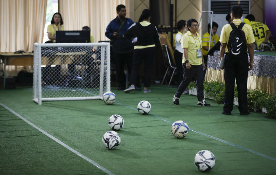 <em>A mini soccer field being set up before the press conference (AP)</em>