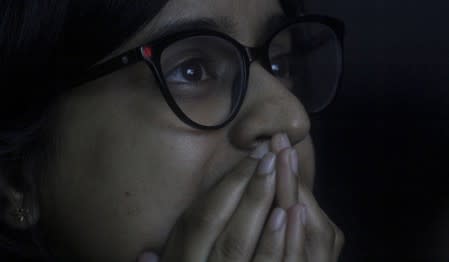 A student reacts as she watches a live stream of Chandrayaan-2 landing at an educational institute in Mumbai