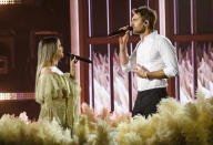 Maren Morris, left, and Ryan Hurd perform at the 56th annual Academy of Country Music Awards on Friday April 16, 2021 at the Ryman Auditorium in Nashville, Tenn. The awards show airs on April 18 with both live and prerecorded segments. (Photo by Amy Harris/Invision/AP)