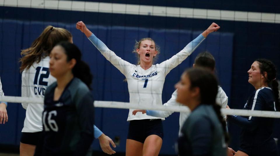 Karlee De Groot of Central Valley Christian celebrates a point against United Christian Academy during their high school state volleyball playoff matchup in Visalia, Calif., Tuesday, Nov. 8, 2022.