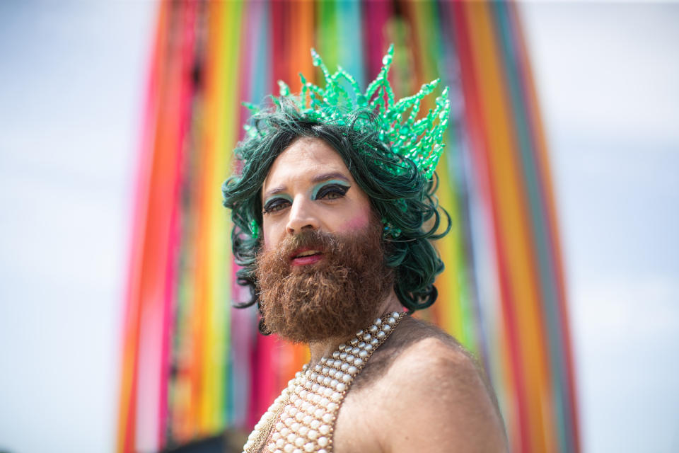 A man dressed as a mermaid on the third day of the Glastonbury Festival at Worthy Farm in Somerset.