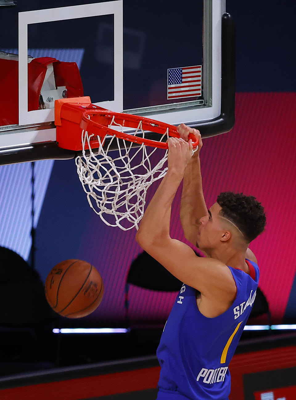 Denver Nuggets' Michael Porter Jr. slam-dunks during the third quarter of an NBA basketball game against the Utah Jazz, Saturday, Aug. 8, 2020, in Lake Buena Vista, Fla. (Kevin C. Cox/Pool Photo via AP)