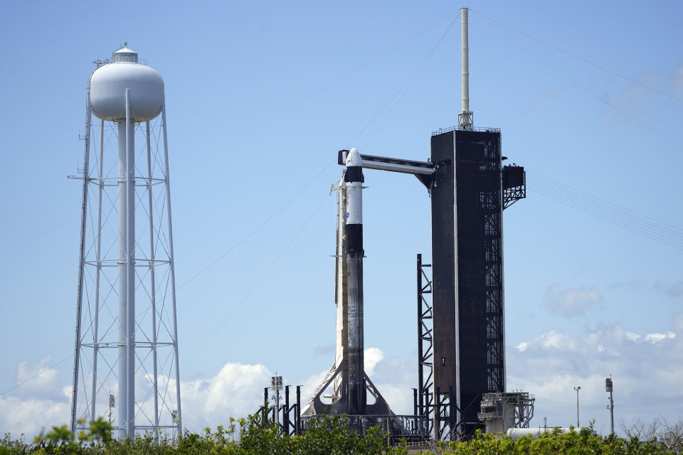 A SpaceX Falcon rocket sits on Launch Complex 39A Tuesday, April 26, 2022, at the Kennedy Space Center in Cape Canaveral, Fla. Four astronauts are scheduled to fly on SpaceX's mission to the International Space Station Wednesday morning. (AP Photo/Chris O'Meara)