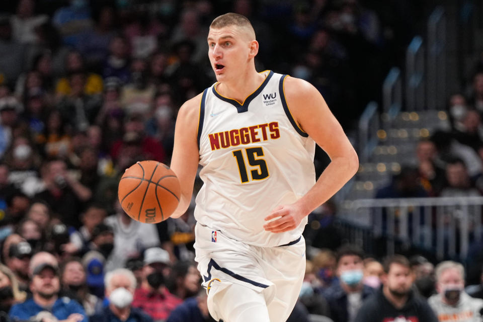 Nikola Jokić dribbles against the Memphis Grizzlies at Ball Arena on January 21, 2022, in Denver, Colorado.