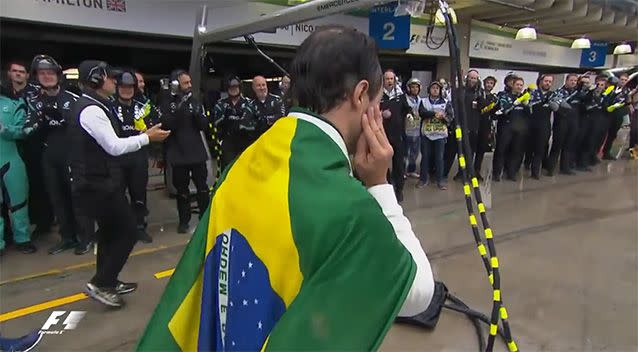 Crews from rival teams applauded Massa as he made his way back to the Williams pit. Photo: Formula One