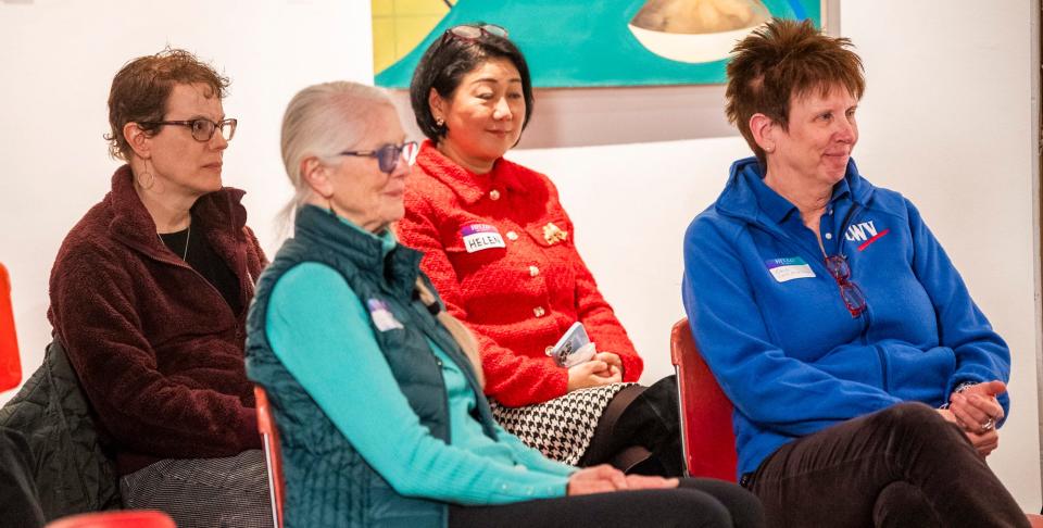Attendees, including Bloomington city council member Isabel Piedmont-Smith, listen to Helen Zia speak during last week's Hoosier Asian American Power launch party at the I Fell Building.