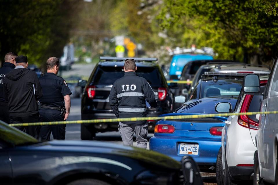 VPD officers and I.I.O detectives are pictured at the scene of a police involved shooting that left one person dead near Commercial Drive and 5th in Vancouver, British Columbia on Thursday, April 28, 2022.