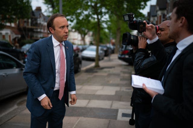 Health Secretary Matt Hancock speaks to the media outside his home in north-west London 