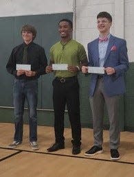 Seniors Deacon Weaver and Joshuah Keith, of Clinton High School, and Dylan Hodge of Oak Ridge High School each received a $1,200 scholarship from the Green McAdoo Cultural Organization at the first Green Tie Gala Aug. 24.