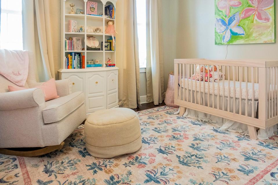 The nursery is the perfect place for a child to sleep and to play.