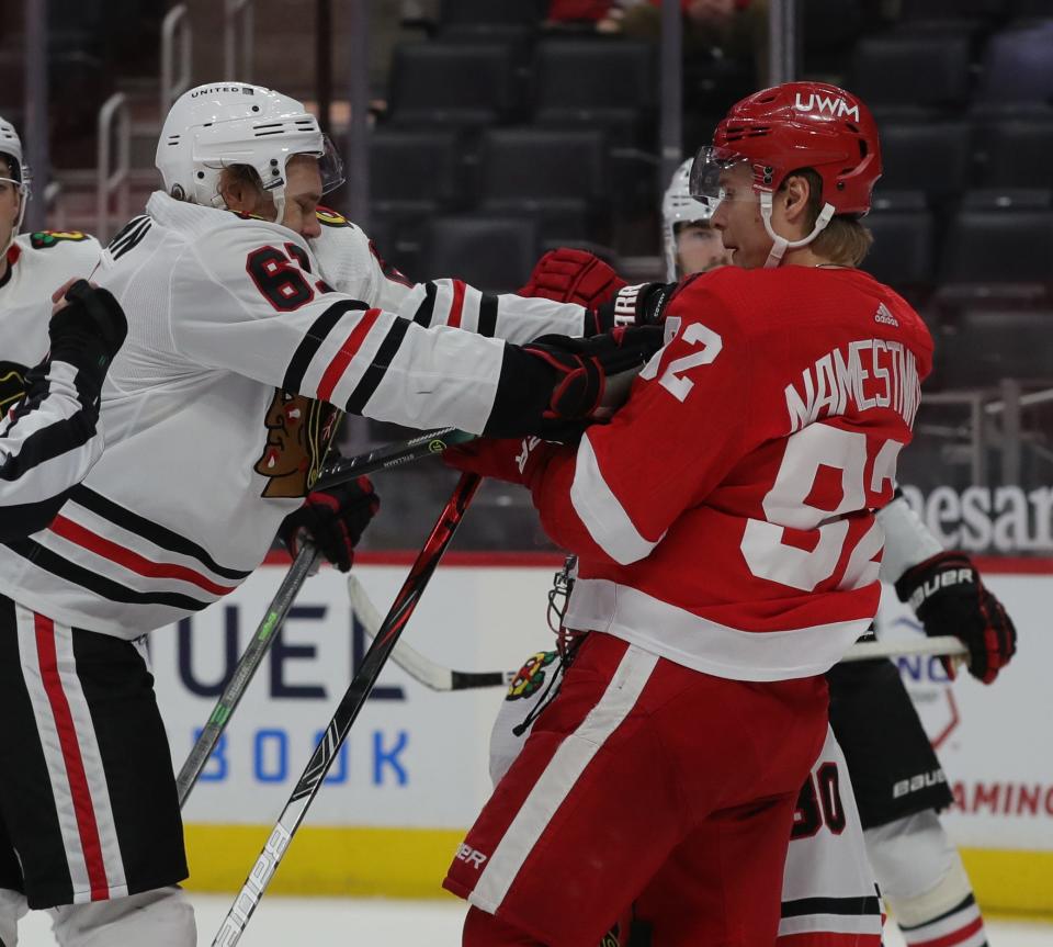 Detroit Red Wings center Vladislav Namestnikov (92) defends against Chicago Blackhawks defenseman Riley Stillman (61) on Saturday, April 17, 2021, at Little Caesars Arena in Detroit.