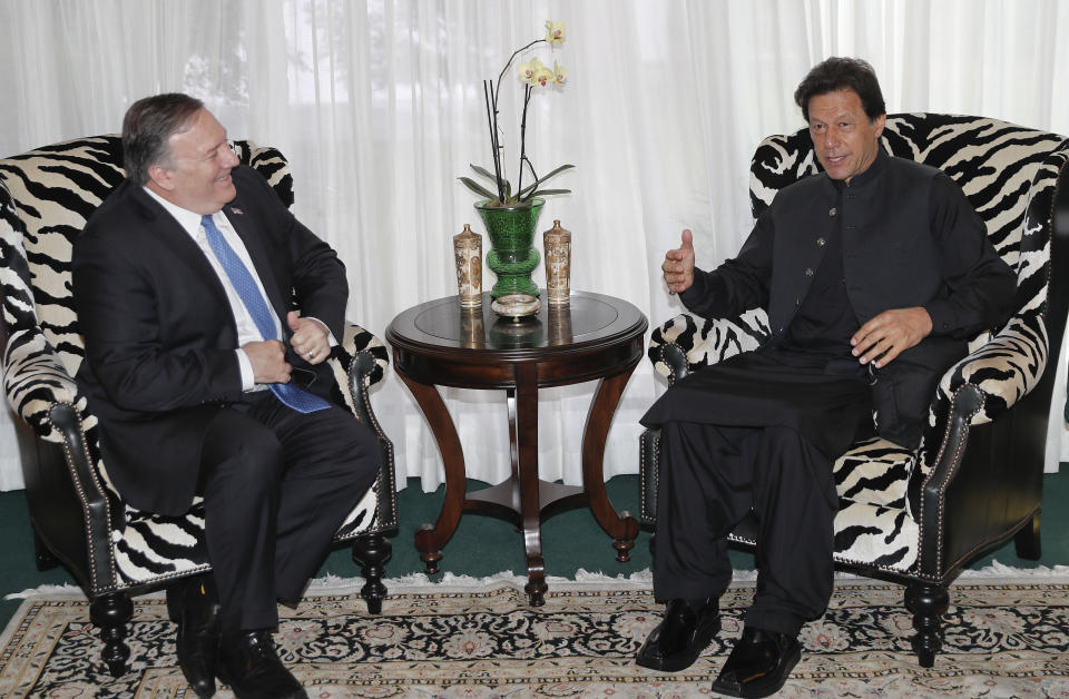 Secretary of State Mike Pompeo, left, meets with Pakistani Prime Minister Imran Khan, right, at the Residence of the Pakistani Ambassador in Washington, Tuesday, July 23, 2019. (AP Photo/Pablo Martinez Monsivais)