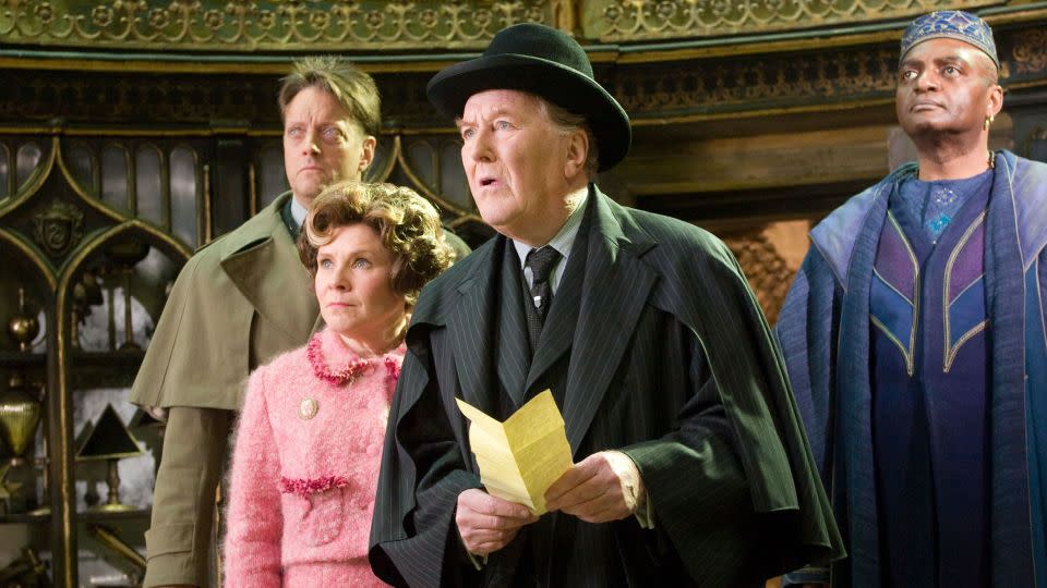 Imelda Staunton as Dolores Umbridge, Robert Hardy as Cornelius Fudge and George Harris as Kingsley Shacklebolt in "Harry Potter and the Order of the Phoenix" - Warner Bros/Courtesy Everett Collection