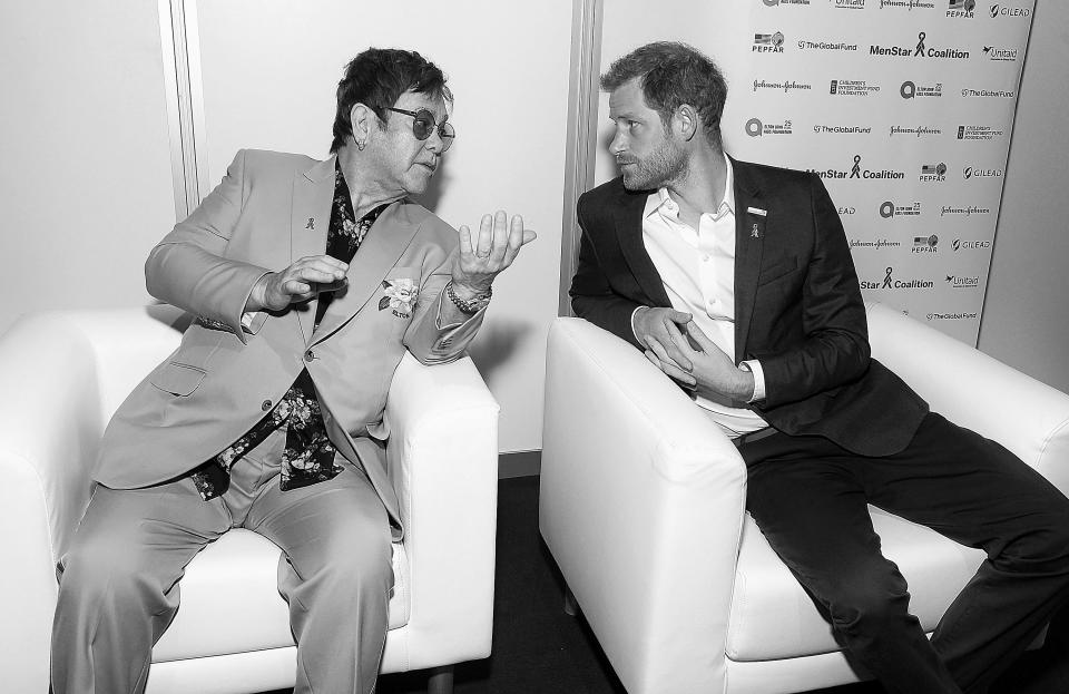 Elton John and Prince Harry attend the Launch of the Menstar Coalition to Promote HIV Testing &amp; Treatment of Men on July 24, 2018, in Amsterdam. (Photo: Michael Kovac via Getty Images)