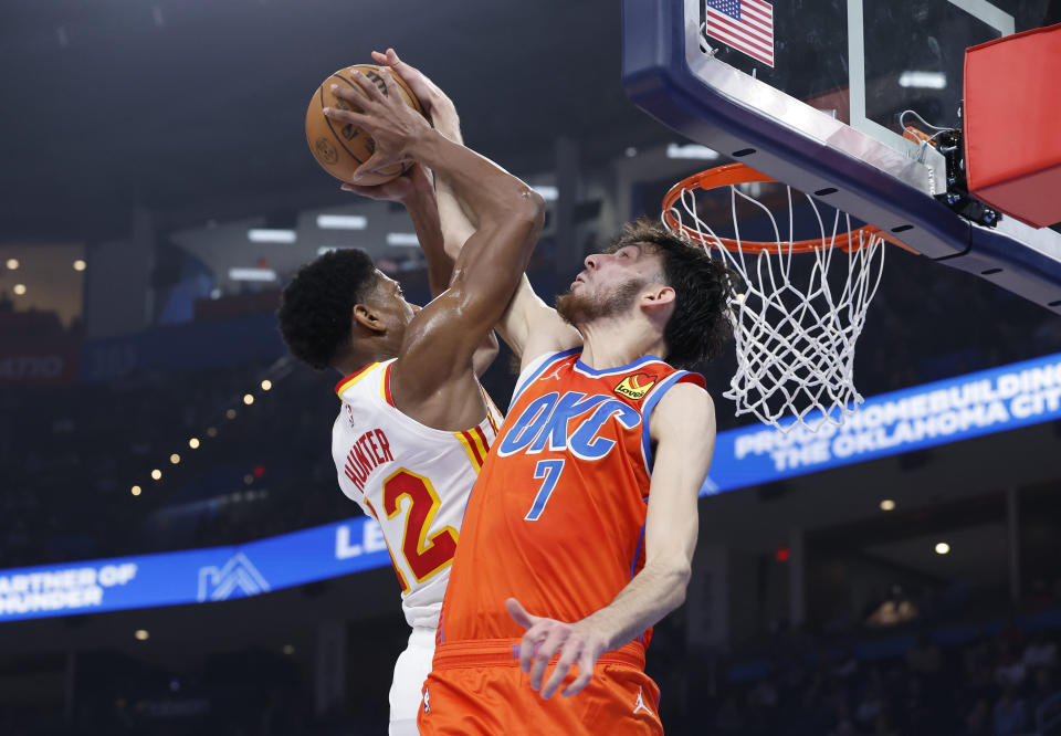 Nov 6, 2023; Oklahoma City, Oklahoma, USA; Oklahoma City Thunder forward Chet Holmgren (7) blocks a shot by Atlanta Hawks forward De’Andre Hunter (12) during the second quarter at Paycom Center. Mandatory Credit: Alonzo Adams-USA TODAY Sports