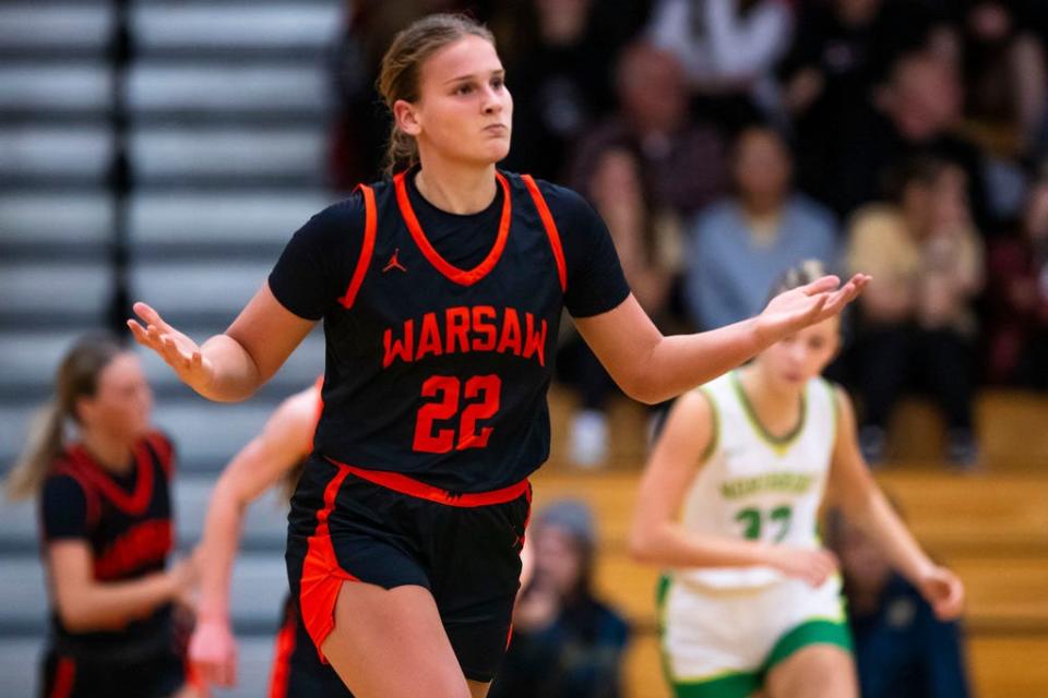 Warsaw's Brooke Winchester (22) celebrates hitting a shot during the Northridge vs. Warsaw girls sectional basketball game Tuesday, Jan. 30, 2024 at Northridge Middle School.