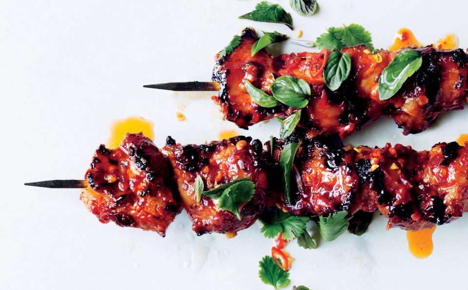 Kebabs get a bad rap. (Decades of alternating zucchini coins and cherry tomatoes can do that.) But this Asian take, with a spicy, sticky glaze, makes for a very convincing comeback. <a rel="nofollow noopener" href="https://www.bonappetit.com/recipe/sambal-chicken-skewers?mbid=synd_yahoo_rss" target="_blank" data-ylk="slk:See recipe.;elm:context_link;itc:0;sec:content-canvas" class="link ">See recipe.</a>