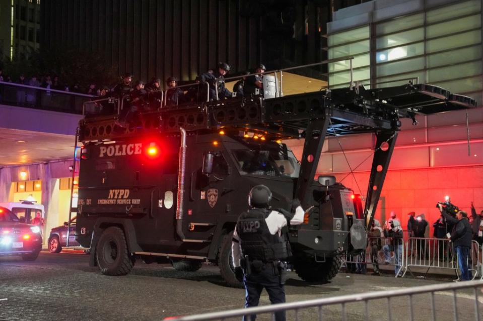 Police use a special vehicle to enter Hamilton Hall. REUTERS