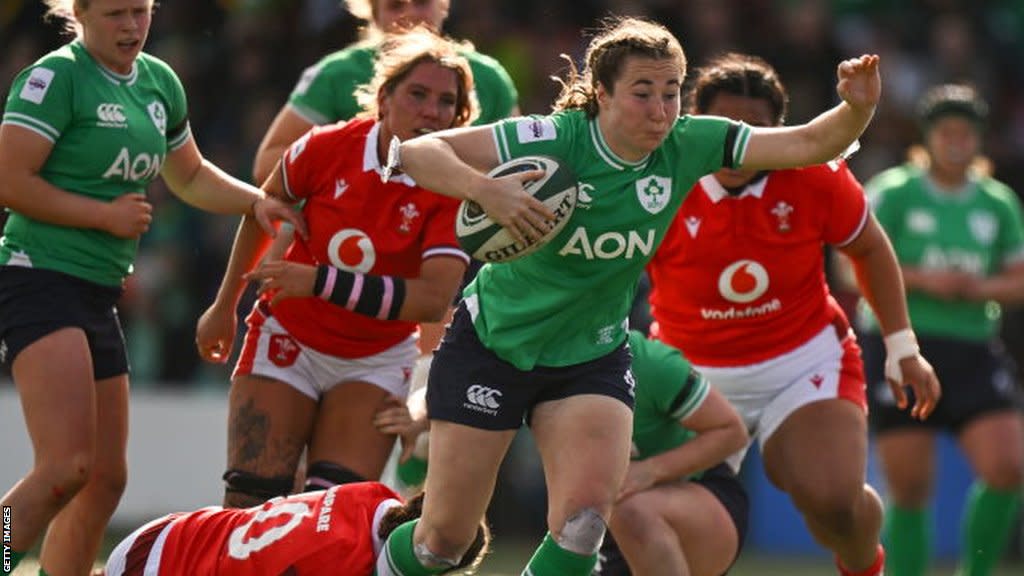 Eve Higgins celebrates her try