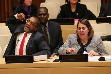 Cuban diplomats protest the launch of a U.S. campaign on Cuban political prisoners at the United Nations in New York, U.S., October 16, 2018. REUTERS/Shannon Stapleton