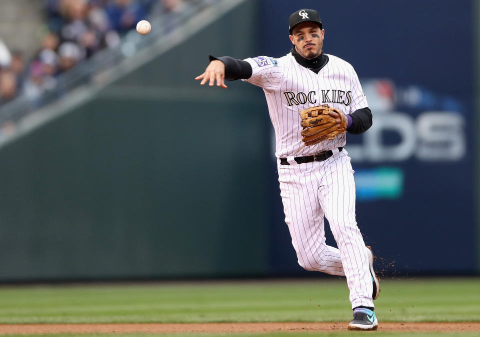 Nolan Arenado is going to let his agent deal with the questions surrounding his contract situation in Colorado. (Getty Images)