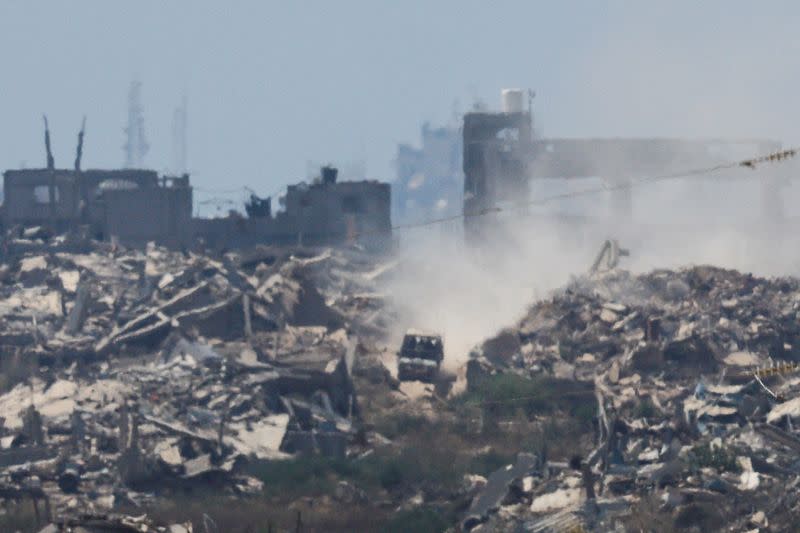 Israeli military vehicle manoeuvres inside the Gaza Strip, near the Israel-Gaza border