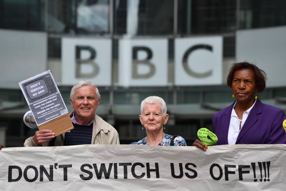 Senior citizens protest outside the BBC studios in London on June 21, 2019 against the end of government funding for free TV licenses for the over 75s. - Funding the free licences is due to be transferred from the Government to the BBC in 2019 as part of an agreement hammered out in 2015. The BBC has said that funding the universal scheme would mean the closure of BBC Two, BBC Four, the BBC News Channel, the BBC Scotland channel, Radio 5 Live, and a number of local radio stations. (Photo by Ben STANSALL / AFP)        (Photo credit should read BEN STANSALL/AFP/Getty Images)