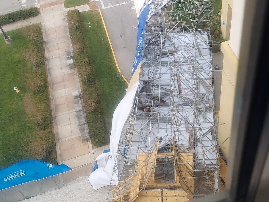 According to a social media post from Halifax Hospital, heavy wind gusts caused the banner to pull down the metal scaffolding in the afternoon.