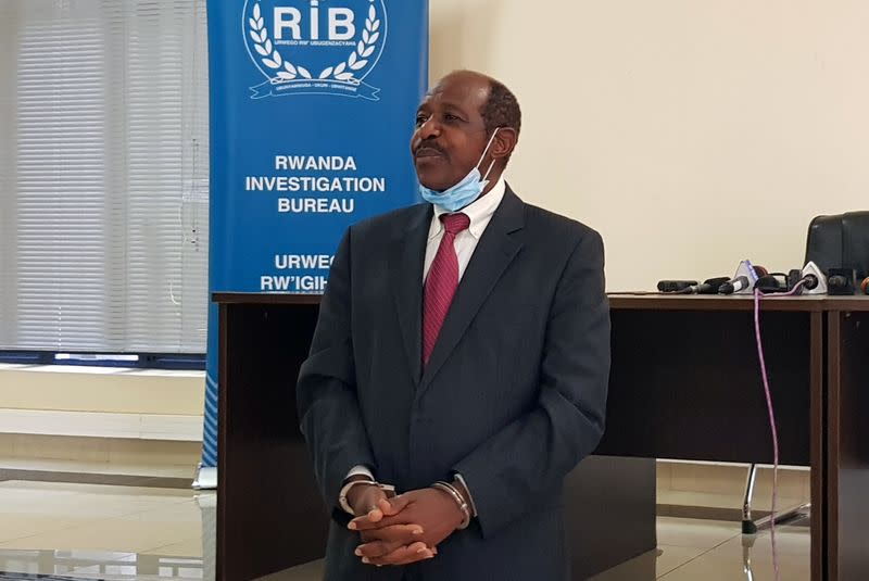 Rusesabagina is detained and paraded in front of media in handcuffs in Kigali