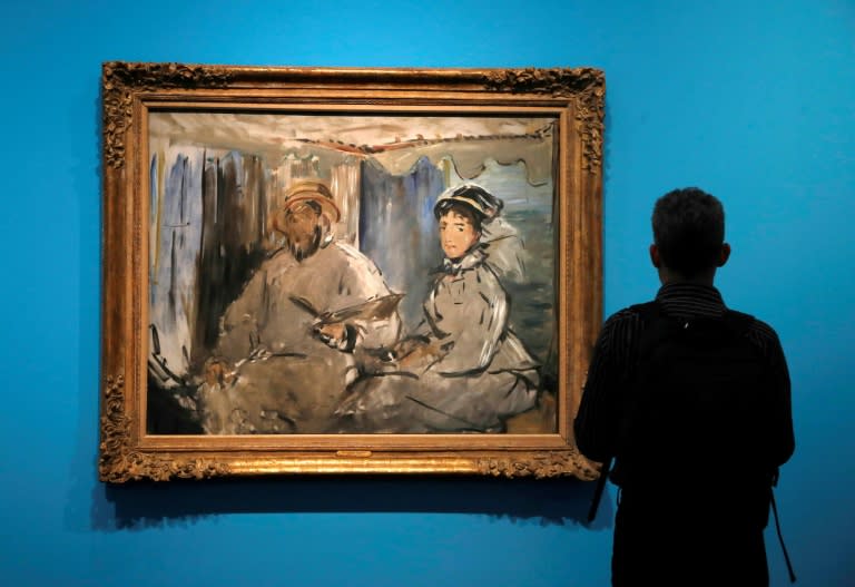 One of the pictures in Claude Monet's private collection is a painting of him and his wife by friend and fellow artist Edouard Manet, entitled "The Painter Monet in His Studio"