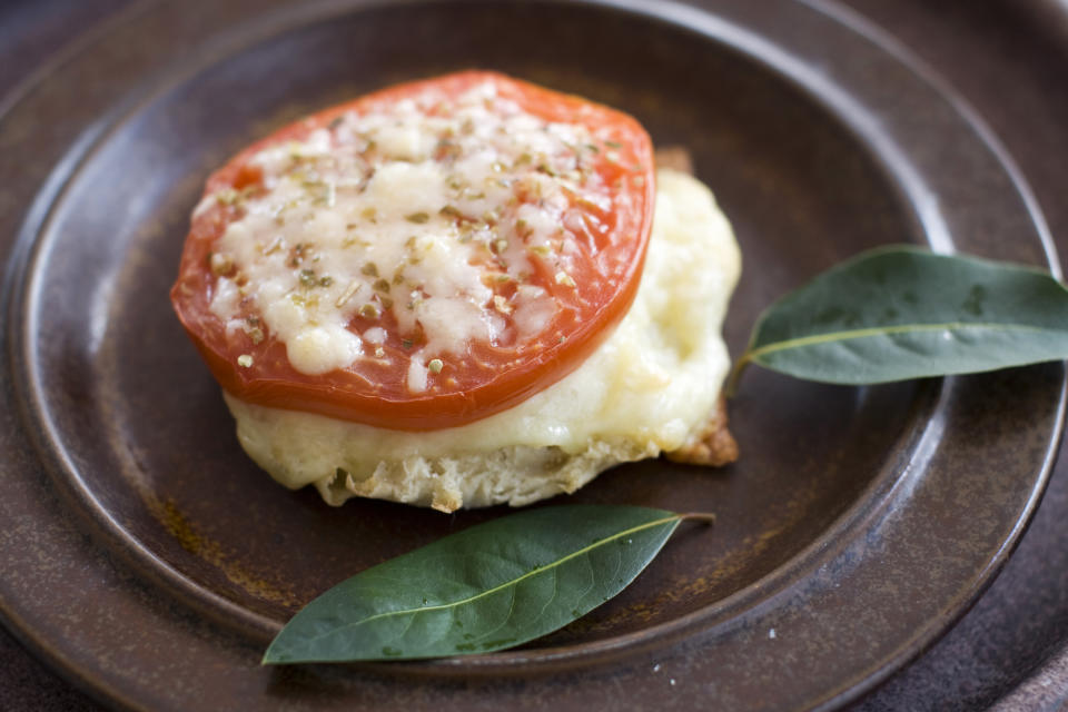 In this image taken on April 1, 2013, an English muffin broiled cheese and tomato sandwich is shown in Concord, N.H. (AP Photo/Matthew Mead)