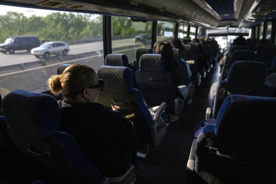 Along with her five grandchildren, Raquel Ayala travels on three-hour bus ride to Logan Correctional Center in downstate Illinois to visit her incarcerated daughter Crystal Martinez, the children's mother, Saturday, May 20, 2023, in Illinois. Rare programs like the Reunification Ride, a donation-dependent initiative that buses prisoners' family members from Chicago to Illinois' largest women's prison every month so they can spend time with their mothers and grandmothers, are a crucial lifeline for families, prisoners say. (AP Photo/Erin Hooley)