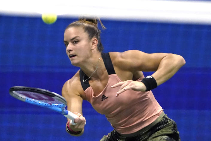 Maria Sakkari, of Greece, returns to Bianca Andreescu, of Canada, during the fourth round of the US Open tennis championships, Monday, Sept. 6, 2021, in New York. (AP Photo/John Minchillo)