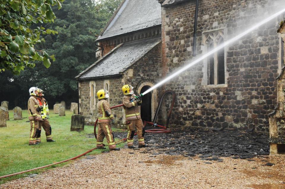 Eastern Daily Press: Damping down after the blaze at St Mary's Church