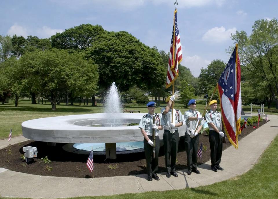 Members of Timken High School’s Junior Reserve Officers’ Training Corps color guard are shown in 2010 at a ceremony rededicating the John F. Kennedy Memorial Fountain at Stadium Park.
