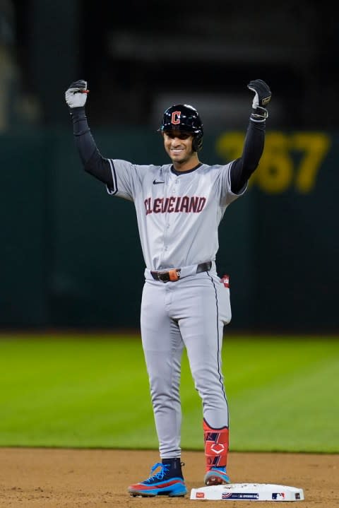 Cleveland Guardians’ Brayan Rocchio celebrates after hitting a two-run double against the Oakland Athletics during the fourth inning of a baseball game Thursday, March 28, 2024, in Oakland, Calif. (AP Photo/Godofredo A. Vásquez)