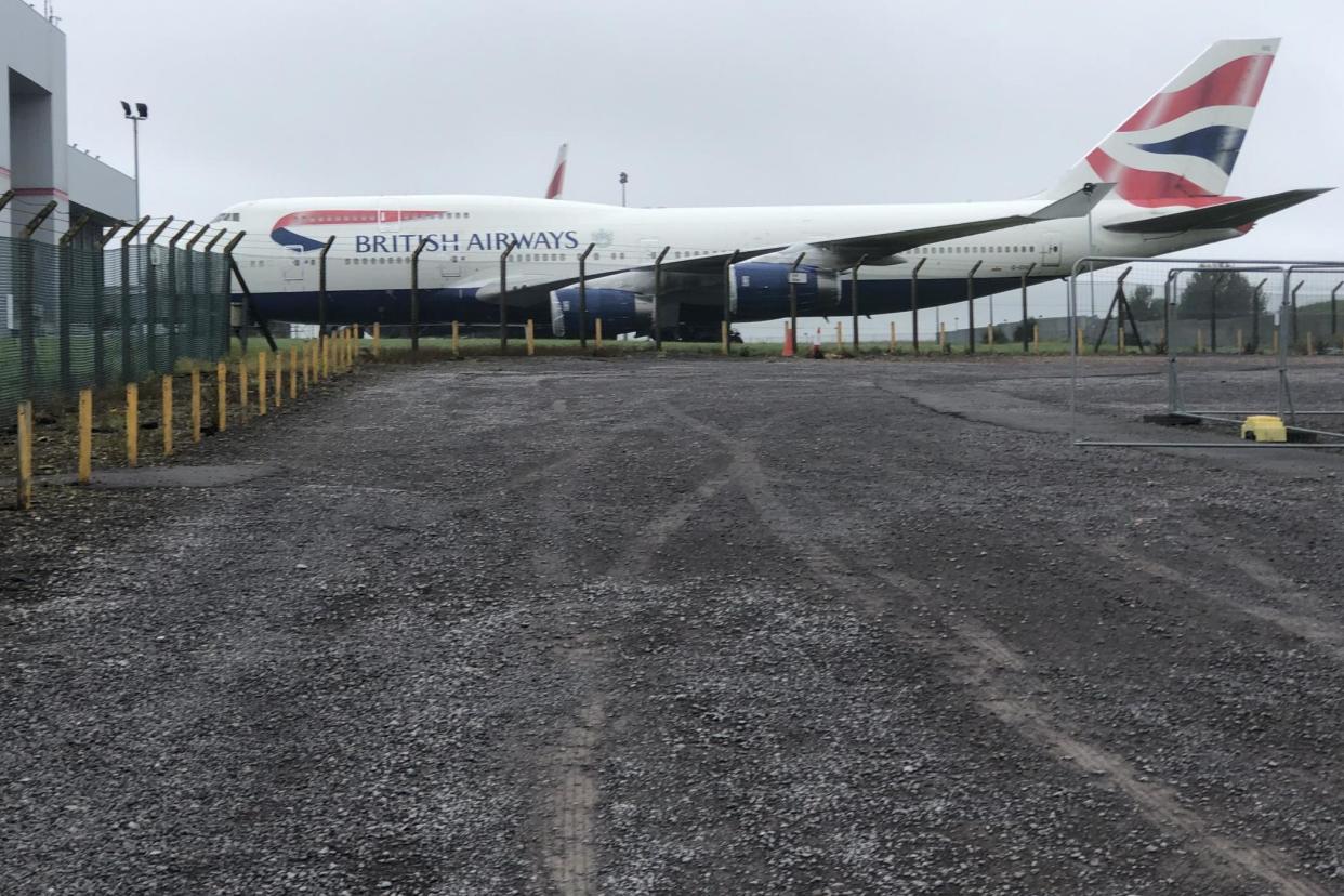 Parking space: Cardiff airport is currently home to some British Airways Jumbo jets (Simon Calder)