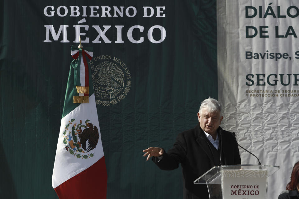 Mexico's President Andres Manuel Lopez Obrador speaks during his visit to the small town of La Mora, Sonora state, Mexico, Sunday Jan. 12, 2020. Lopez Obrador said Sunday there is an agreement to establish a monument will be put up to memorialize nine U.S.-Mexican dual citizens ambushed and slain last year by drug gang assassins along a remote road near New Mexico. (AP Photo/Christian Chavez)