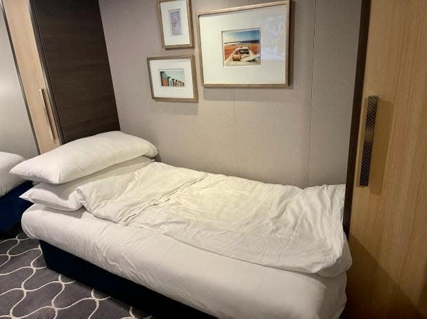 couch turned into small bed in symphony of the seas cruise interior room