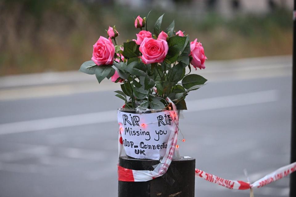 Flowers left at the scene on Thursday (Jeremy Selwyn)