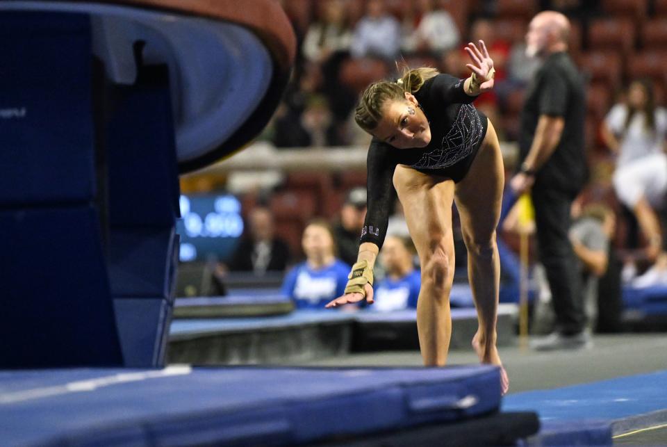 Utah State’s Alivia Ostendorf, competes in the vault as BYU, Utah, SUU and Utah State meet in the Rio Tinto Best of Utah Gymnastics competition at the Maverick Center in West Valley City on Monday, Jan. 15, 2024. | Scott G Winterton, Deseret News