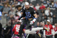 NFC tight end George Kittle (85) of the San Francisco 49ers celebrates a touchdown with NFC wide receiver Justin Jefferson of the Minnesota Vikings during the flag football event at the NFL Pro Bowl against the AFC, Sunday, Feb. 5, 2023, in Las Vegas. (AP Photo/John Locher)