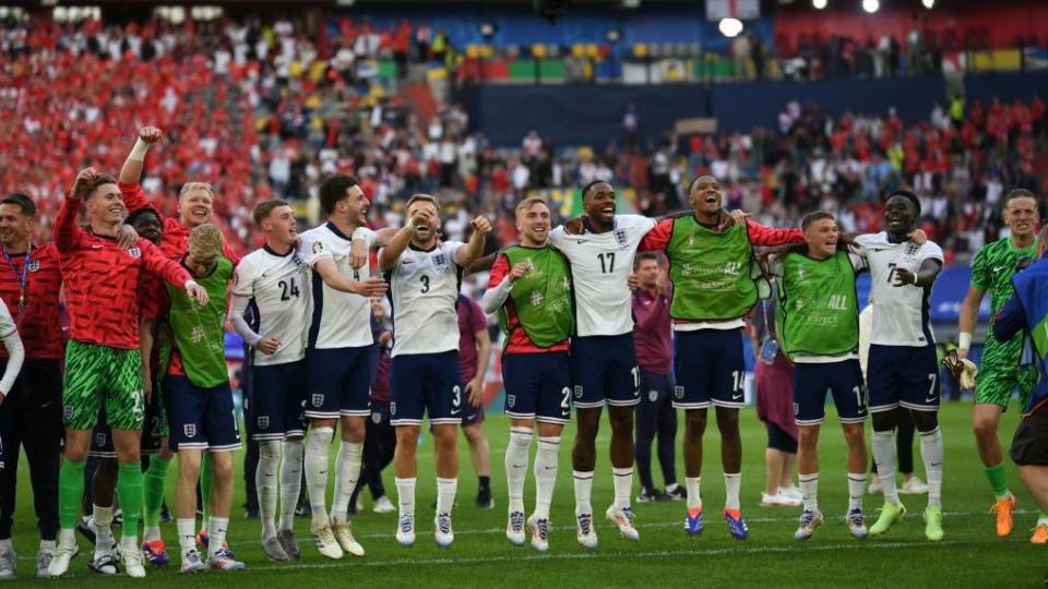 England players celebrate their penalty shootout win against Switzerland