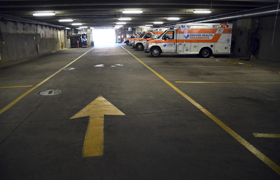 Ambulances are parked in Denver on Thursday, Oct. 20, 2022. The city's STAR program uses clinicians and EMTs or paramedics to respond to nonviolent mental health crises, instead of police. Data gathered by The Associated Press show at least 14 of the 20 most populous U.S. cities are hosting or starting such programs, sometimes called civilian, alternative or non-police response teams. They span from New York and Los Angeles to Columbus, Ohio, and Houston, and boast annual budgets that together topped $123 million as of June 2023, the AP found. (AP Photo/Thomas Peipert)