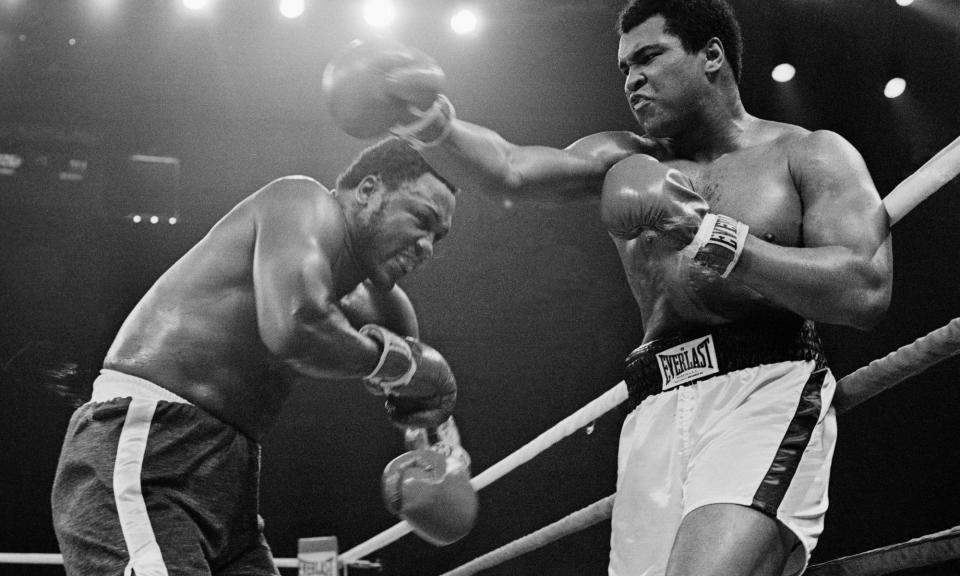 <span>Joe Frazier and Muhammad Ali in action during the ‘Thrilla in Manila’.</span><span>Photograph: Bettmann/Bettmann Archive</span>