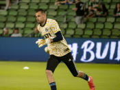 Austin FC goalkeeper Brad Stuver warms up before an MLS soccer match against the LA Galaxy, Sunday, Sept. 26, 2021, in Austin, Texas. (AP Photo/Michael Thomas)