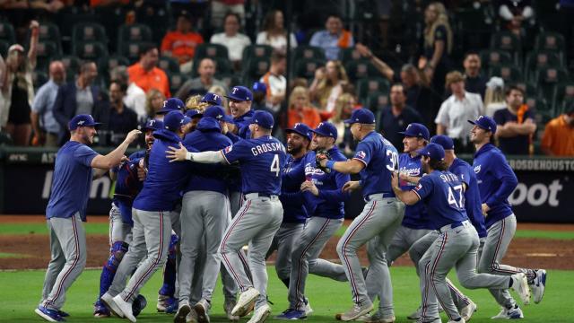 Astros fans greet Phillies fan decked out for World Series Game 1