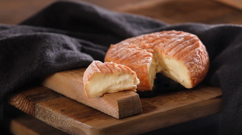 Époisses cheese on a board