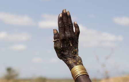 The Wider Image: When raiders menace in northern Kenya, grab your guns